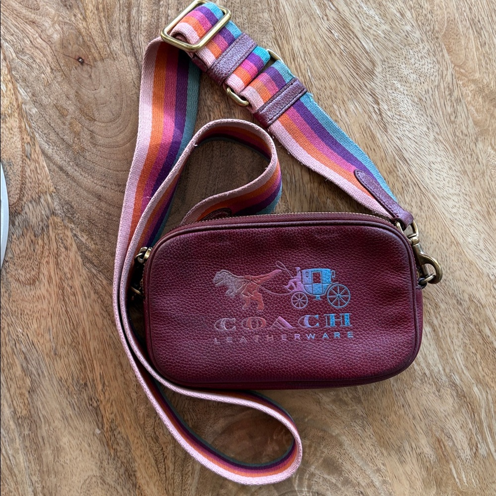 Coach Dinosaur Carriage Crossbody Bag with Vibrant Strap
